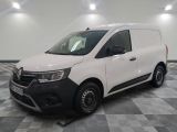 the white van is parked on a checkered tile floor