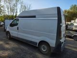 a white van that is parked in a lot