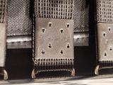 a close up of a metal object with a tag on it