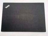 a black mouse pad with a white logo on it