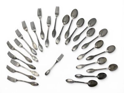 a lot of silver spoons and forks arranged in a circle