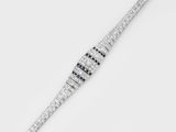 une image représentant un bracelet en diamants et saphirs sur fond blanc