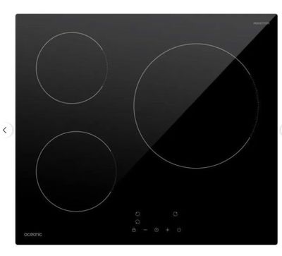 a black stove top with three burners on it