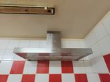 a red and white checkered floor in a bathroom