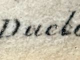 a close up of a piece of paper with writing on it