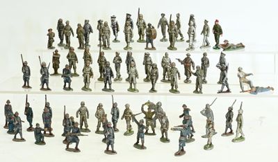a lot of figurines that are on a shelf