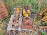 un tas de vieilles machines qui traînent dans l'herbe