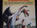 la couverture du livre *Les Charogards du Cosmos*, sur laquelle figure la photo d'un homme