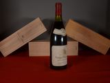 a bottle of wine that is sitting on a table