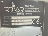 a close up of a sign on the side of a machine