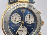 a close up of a person ' s hand holding a watch