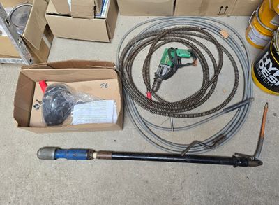 a lot of tools that are sitting on the floor