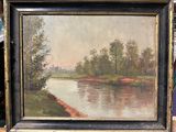 une photo d'un tableau représentant une rivière, dans un cadre
