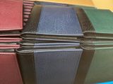 a lot of books that are sitting on a table