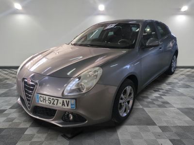 a picture of a car that is parked in a garage