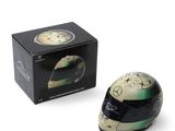 a helmet that is sitting next to a box