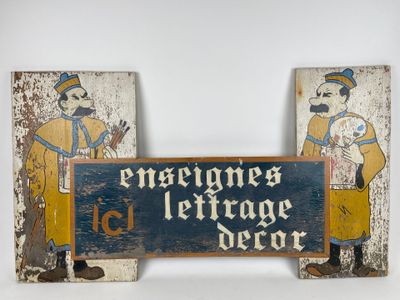 pair of antique carved wood signs of a couple of men and a woman