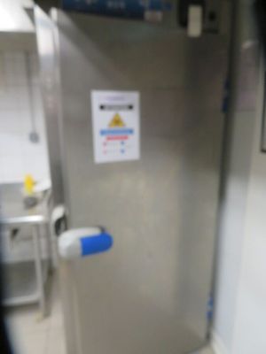 an image of a stainless steel refrigerator in a kitchen
