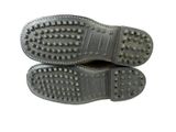 pair of black leather shoes with studded soles on a white background