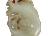 an image of a white jade sculpture of a dragon on a white background