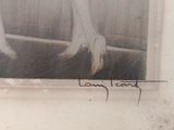 a black and white photo of a woman ' s legs in high heels
