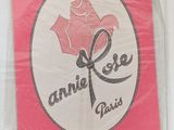 an image of a pink sticker with a rose on it