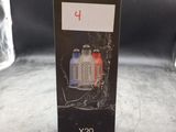 a close up of a box on a table with a bottle of water