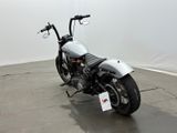 a motorcycle that is parked on the concrete floor