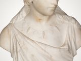 marble bust of a woman wearing a turban on a pedestal