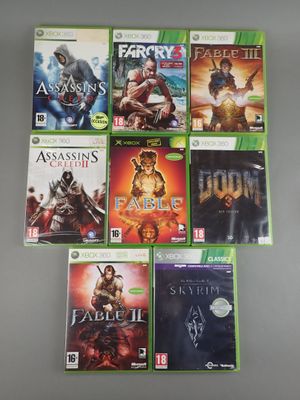 a bunch of video games are sitting on a table