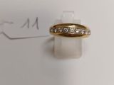an image of a wedding ring with diamonds on it