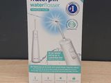a box of waterpik water flosser sitting on a table