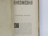 an open book with a picture of a cat on it