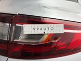 a sticker on the back of a car that says vauto