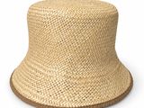 a close up of a straw hat on a white background