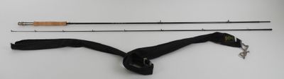 two fishing rods and a fishing rod on a table
