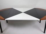 an image of a table with two black and white triangles on it
