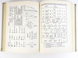 an open book with a diagram of electrical equipment