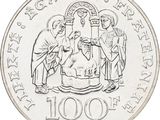 an image of a coin with the image of a man and woman on it