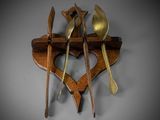 a wooden spoon and spoon holder with spoons and spoons on it