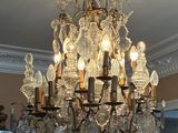 a chandelier that is hanging from the ceiling