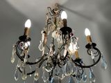 a chandelier that is hanging from the ceiling
