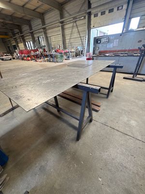 a large table in the middle of a large room