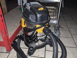 a picture of a wet dryer sitting on a tiled floor