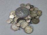 a lot of coins that are on a table