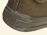 a close up of a pair of shoes on a white background