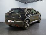 a picture of a black car in a showroom