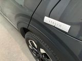 a close up of a car with a sticker on the side of it