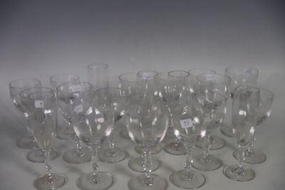 a lot of empty wine glasses sitting on a table