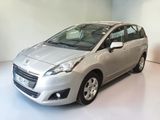 a picture of a silver car in a showroom